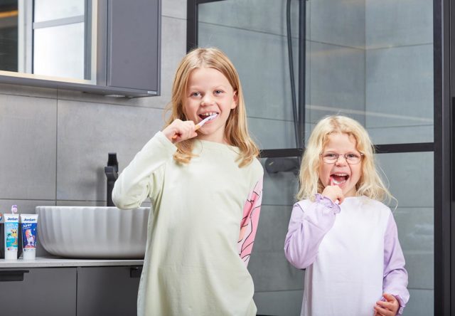 Kids brushing their teeth