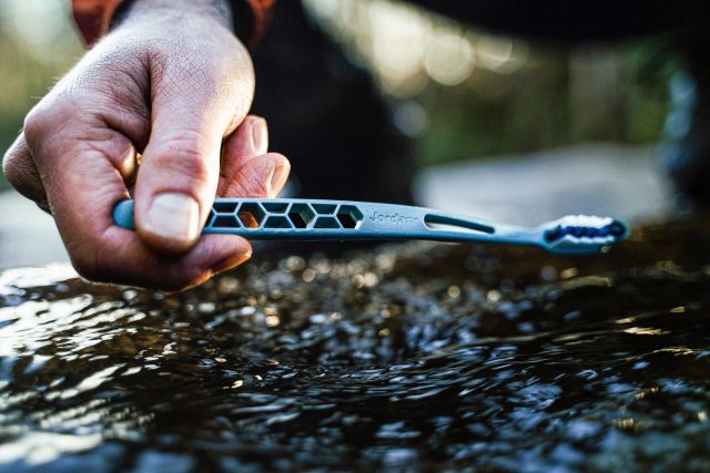 ultralite toothbrush in a stream